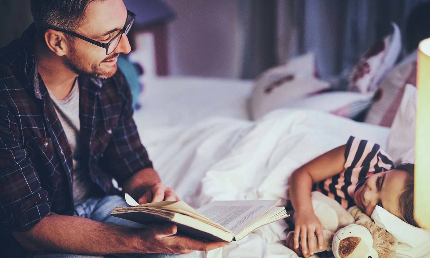 Father reading to child