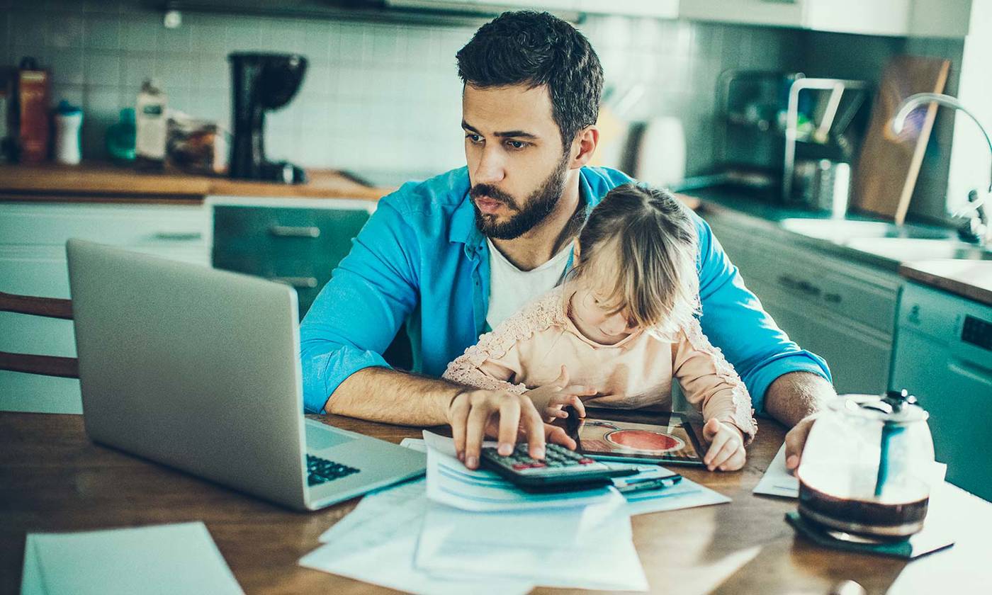 man at computer with daughter