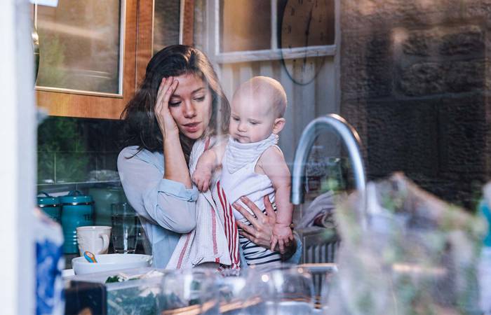 mother overwhelmed with baby