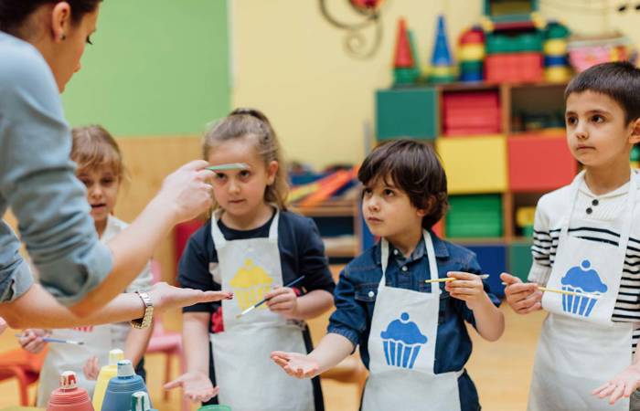 teacher in classroom with children