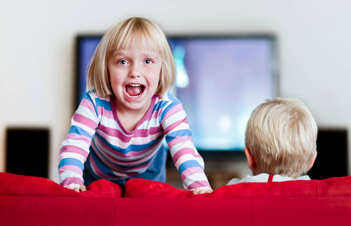 Excited three-year-old simply cannot sit still