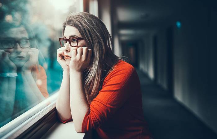Thoughtful, worried woman