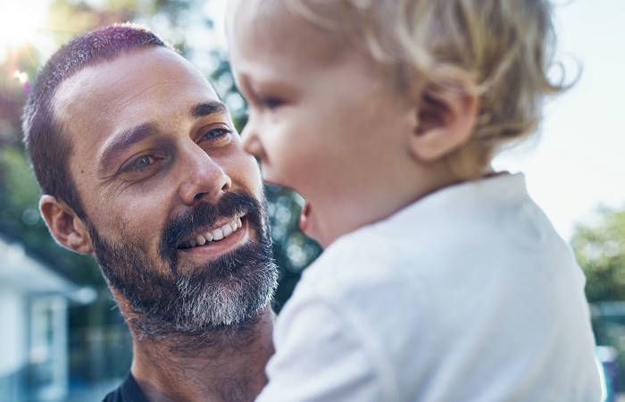 Father playing with his baby boy