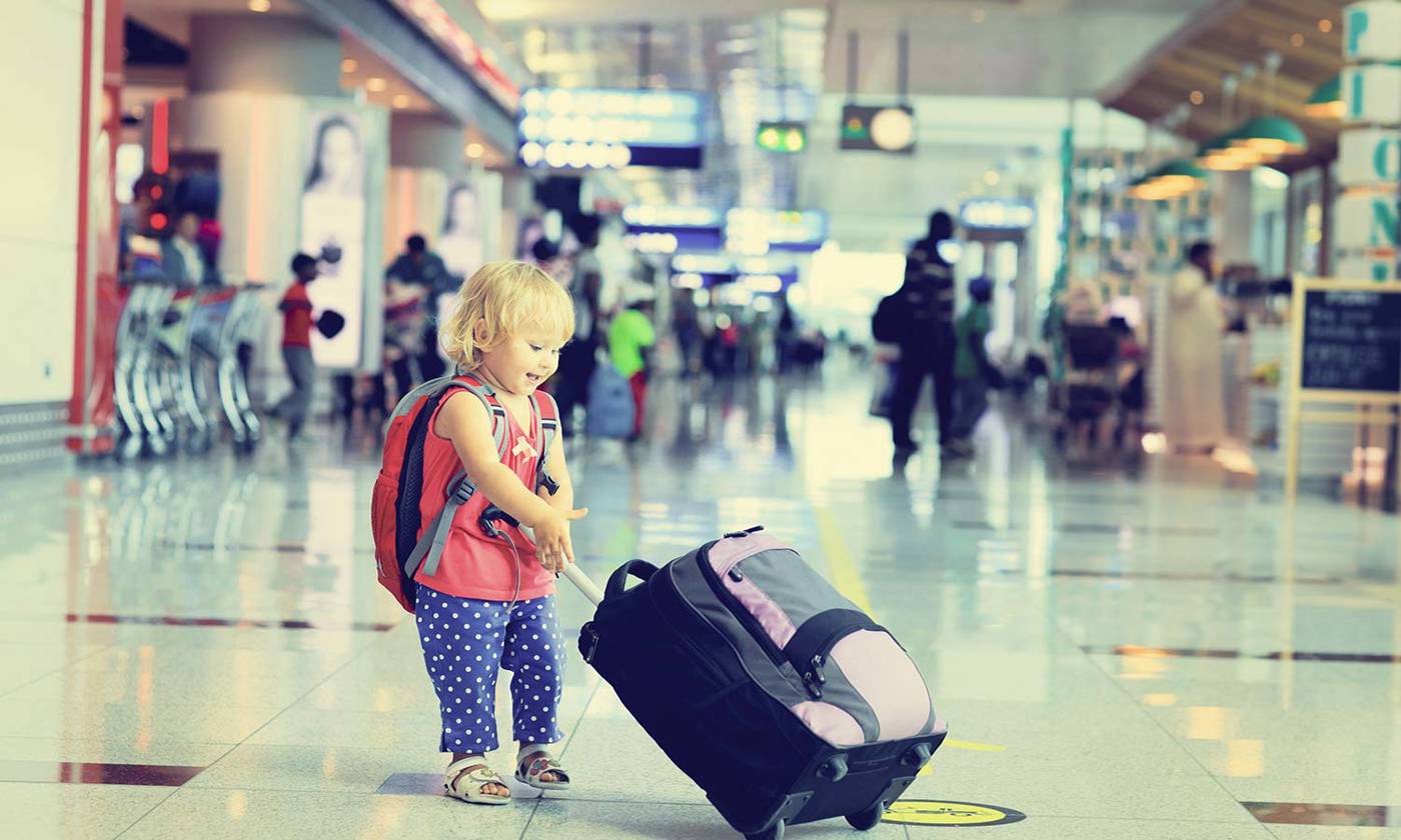 Little girl with a suitcase
