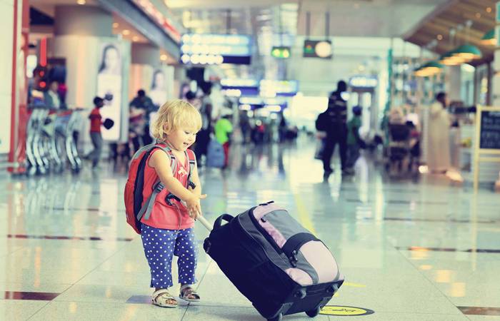 Little girl with a suitcase