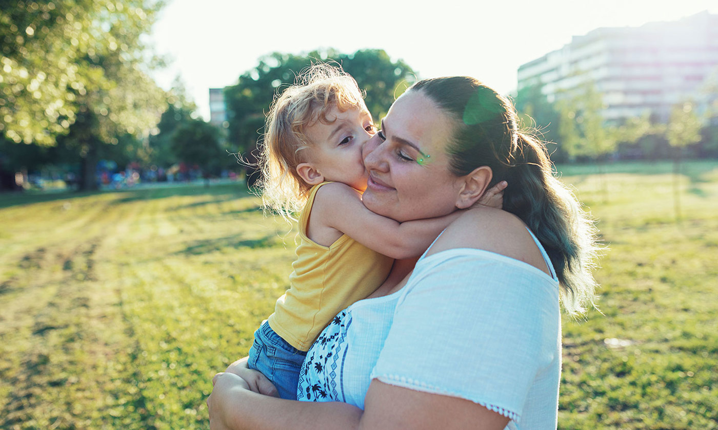 Single parent with child in the park