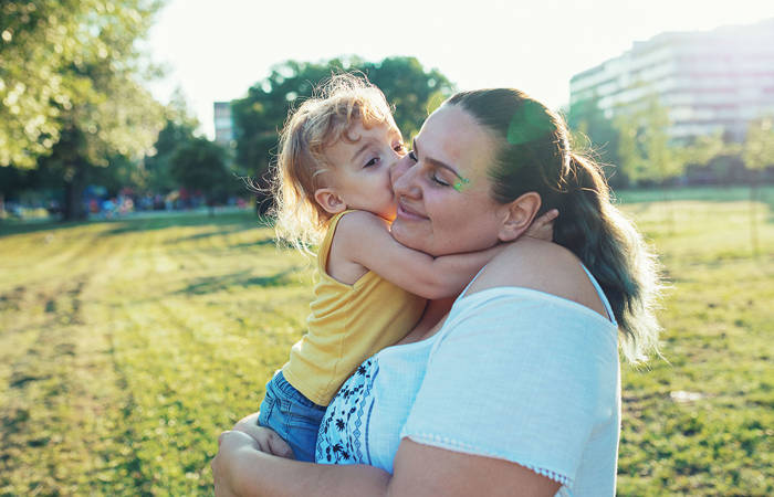 Single parent with child in the park