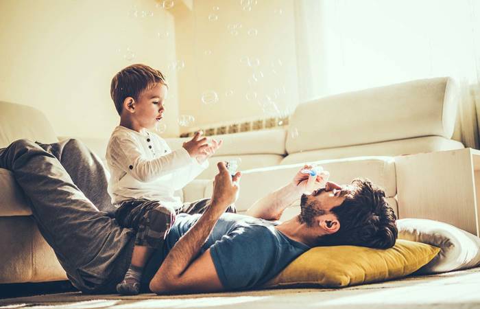 Son playing with dad