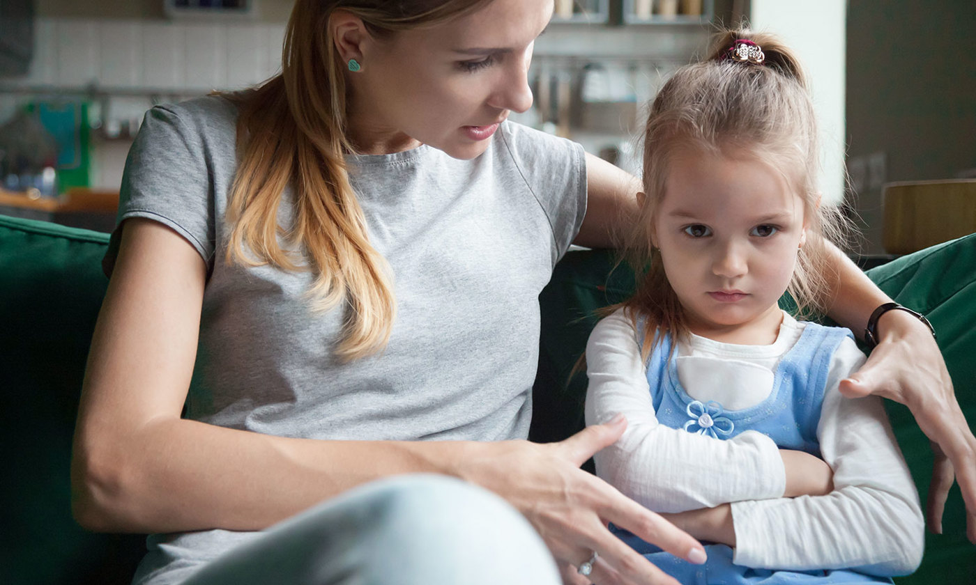 Angry offended little girl not listening to mother