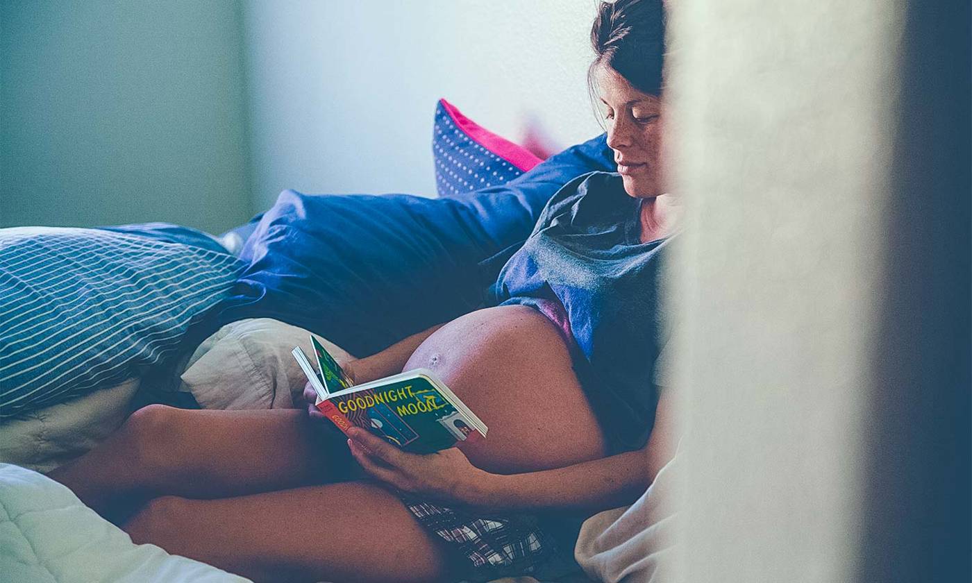 Pregnant mother reading