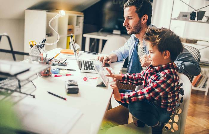 Father and son on computer and ipad