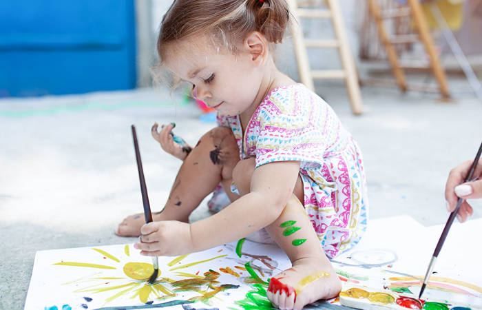 Girl enjoying painting