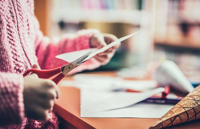 Child's hands doing craft